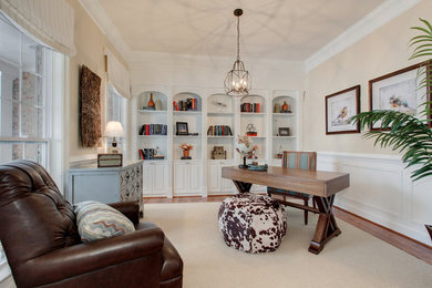 Mid-sized transitional freestanding desk vinyl floor home office photo in DC Metro with beige walls and no fireplace