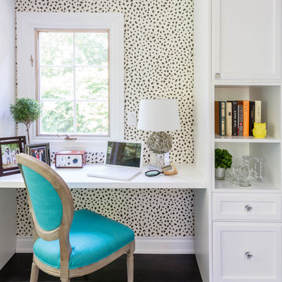Inspiration for a small contemporary built-in desk dark wood floor and brown floor study room remodel in Toronto with multicolored walls and no fireplace