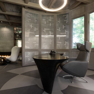 Inspiration for a contemporary freestanding desk gray floor home office remodel in Sacramento with gray walls