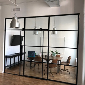 Steel &Glass Office Space with Suspended  Door