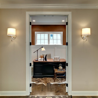 Inspiration for a timeless freestanding desk dark wood floor and brown floor home office remodel in Minneapolis