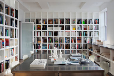 Inspiration for a modern home office in New York with white walls, a freestanding desk and a reading nook.