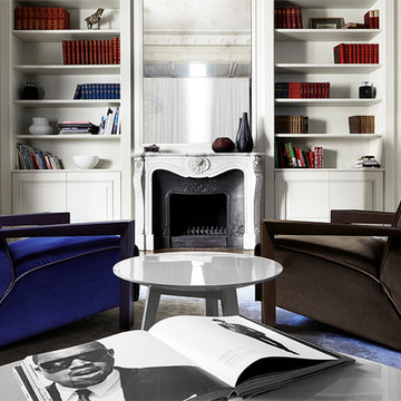 Study with alcove shelving and ornate fireplace