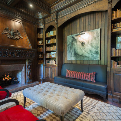 Inspiration for a large mediterranean freestanding desk dark wood floor study room remodel in Atlanta with brown walls, a standard fireplace and a stone fireplace