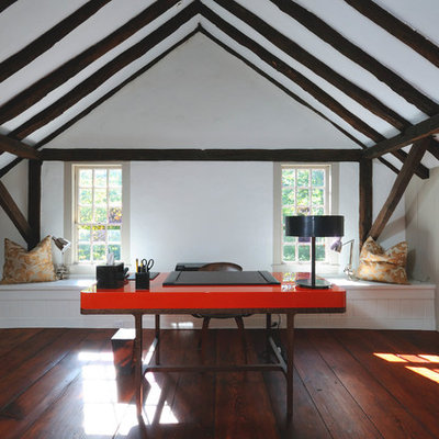Study room - mid-sized traditional freestanding desk dark wood floor study room idea in Other with white walls