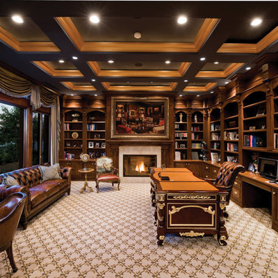 Inspiration for a timeless freestanding desk carpeted home office remodel in Las Vegas with a standard fireplace
