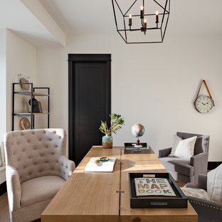 Inspiration for a farmhouse freestanding desk light wood floor and beige floor home office remodel in Phoenix with white walls
