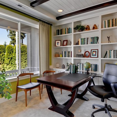 Inspiration for a mid-sized transitional freestanding desk carpeted home office remodel in Seattle with green walls