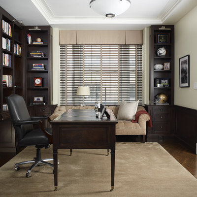 Inspiration for a mid-sized timeless freestanding desk dark wood floor and brown floor home office remodel in New York with white walls and no fireplace