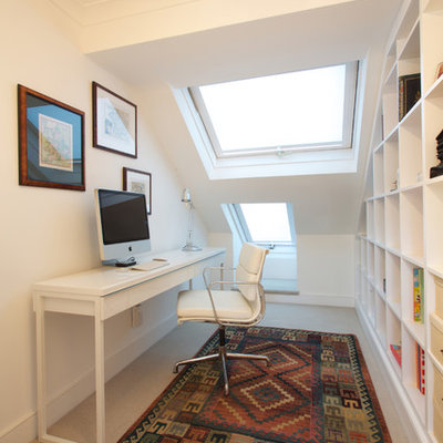 Inspiration for a contemporary freestanding desk carpeted study room remodel in London with white walls