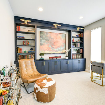 Study room - mid-sized eclectic freestanding desk carpeted and multicolored floor study room idea in Denver with beige walls