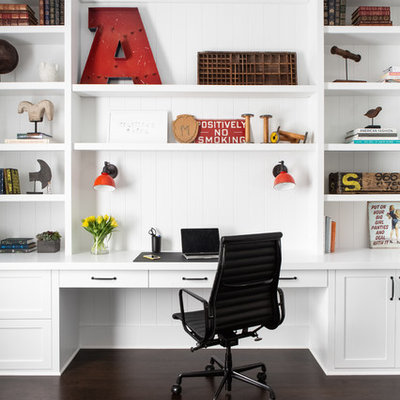 Inspiration for a large farmhouse built-in desk dark wood floor and brown floor study room remodel in New York with white walls