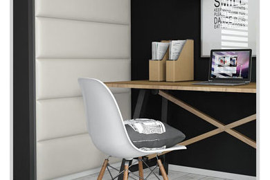 Diseño de despacho minimalista con paredes negras, suelo de madera clara y escritorio independiente