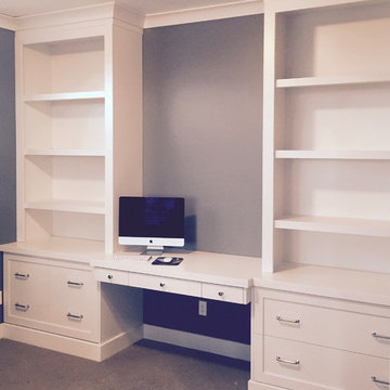 Various built-in desks and entertainment centers