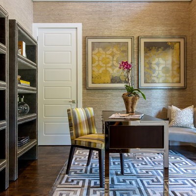 Example of a mid-sized transitional freestanding desk dark wood floor study room design in Dallas with brown walls