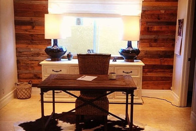 Home office - mid-sized rustic freestanding desk marble floor home office idea in Orange County with no fireplace