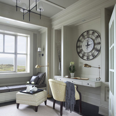 Inspiration for a timeless built-in desk dark wood floor home office remodel in Dublin with gray walls