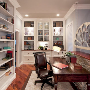 Inspiration for a transitional freestanding desk dark wood floor home office remodel in San Francisco with gray walls