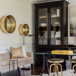 Mid-sized transitional freestanding desk dark wood floor and brown floor home office photo in Boston with white walls
