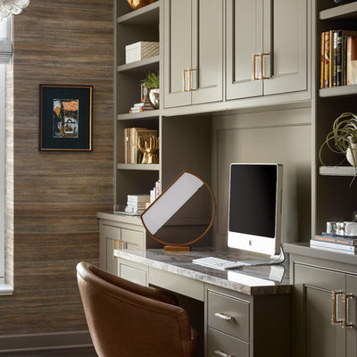 Small transitional built-in desk dark wood floor and brown floor home office photo in Chicago with multicolored walls and no fireplace