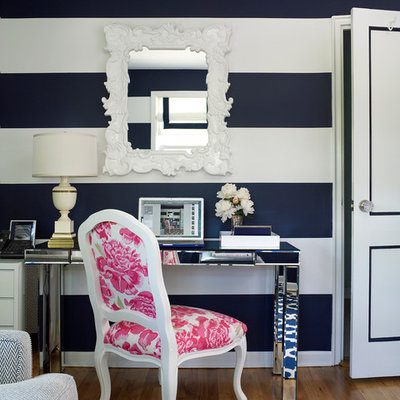 Home office - transitional freestanding desk medium tone wood floor home office idea in New York with multicolored walls