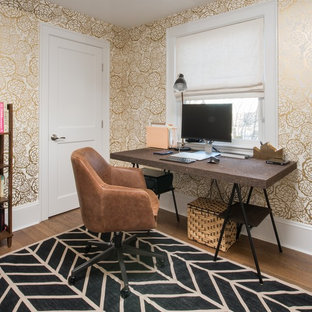 Study room - mid-sized transitional freestanding desk medium tone wood floor and brown floor study room idea in Boston with multicolored walls and no fireplace