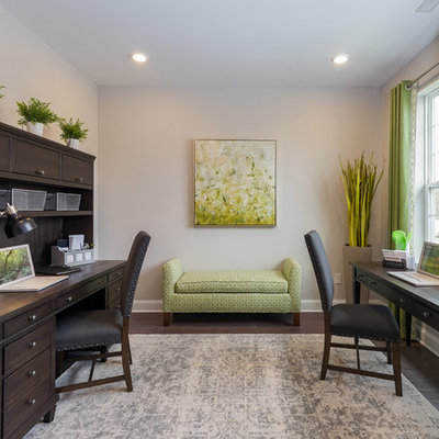 Mid-sized transitional freestanding desk dark wood floor and brown floor study room photo in Philadelphia with gray walls