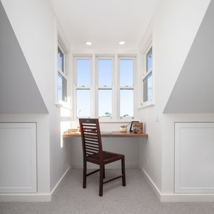 Ornate carpeted and beige floor home office photo in Sydney with white walls, a corner fireplace and a brick fireplace