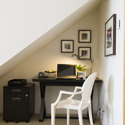 Inspiration for a contemporary freestanding desk carpeted home office remodel in Vancouver with white walls