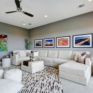 Home theater - large contemporary enclosed carpeted home theater idea in Austin with gray walls