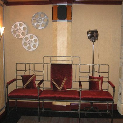 Home theater - large traditional enclosed carpeted and multicolored floor home theater idea in Other with beige walls and a projector screen