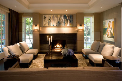 Home theater - transitional dark wood floor and black floor home theater idea in San Francisco with a media wall