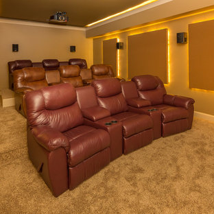 Example of a mid-sized minimalist enclosed carpeted and beige floor home theater design in Raleigh with beige walls and a projector screen