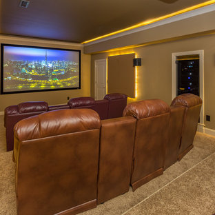 Home theater - mid-sized modern enclosed carpeted and beige floor home theater idea in Raleigh with beige walls and a projector screen