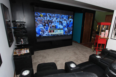 Inspiration for a contemporary home theater remodel in Oklahoma City