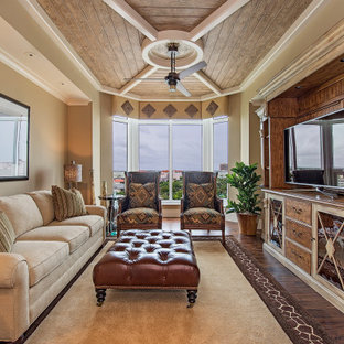 Example of an island style home theater design in Other