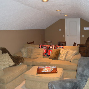 Mid-sized elegant enclosed carpeted home theater photo in Miami with brown walls