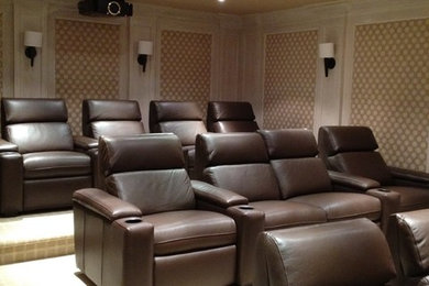 Example of a transitional home theater design in New York