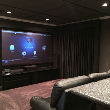 Control4 navigator on a 100" Screen Innovations Black Diamond fixed screen with
