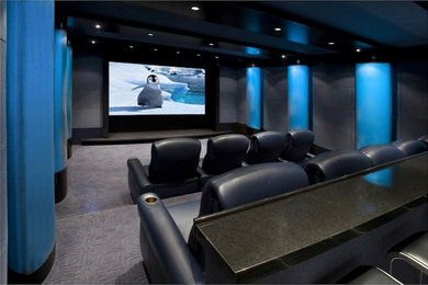 Home theater - mid-sized modern enclosed carpeted and gray floor home theater idea in Little Rock with a projector screen