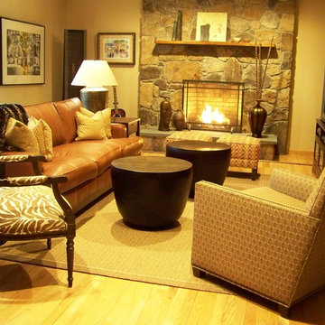 Cozy and Inviting Family Room in Warm Leather and Natural Wood Tones