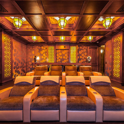 Home theater - large craftsman enclosed carpeted and brown floor home theater idea in San Diego with brown walls