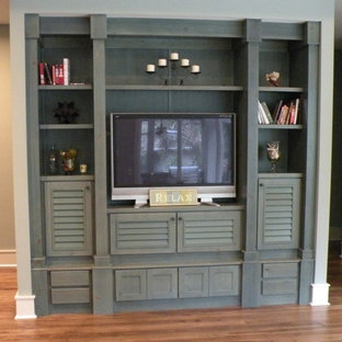 Home theater - tropical home theater idea in Jacksonville