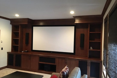 Inspiration for a contemporary home theater remodel in Calgary