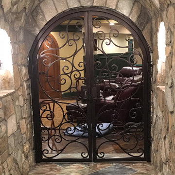 Beautiful & Ornate Wine Cellar Doors to House Your Collection