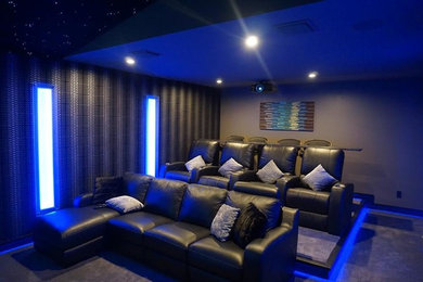 This is an example of a contemporary home cinema in Orlando.