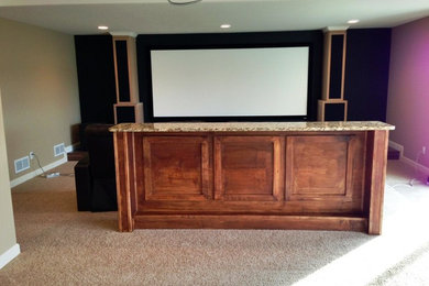 Inspiration for a mid-sized timeless home theater remodel in Minneapolis