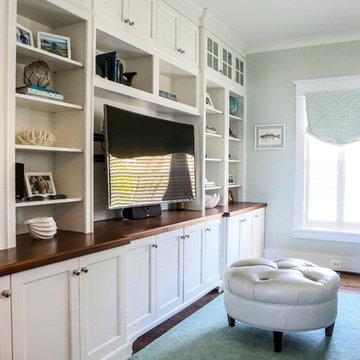 Entertainment Room With Custom Built-in Shelving and Cabinetry