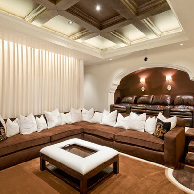 Large tuscan enclosed carpeted and brown floor home theater photo in Phoenix with brown walls