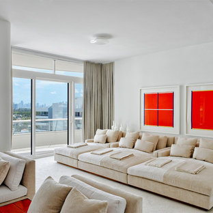 Inspiration for a contemporary white floor home theater remodel in Miami with white walls